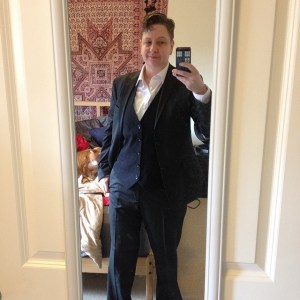 Going to a presentation, he is looking pretty dapper.