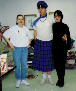 In 1997 I am in the skirt, the hubby is wearing all black (before transition of course).